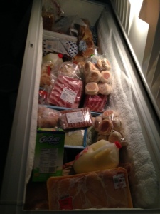 My freezer before.  Unorganized, full of frost, and full of food that needs to be utilized.