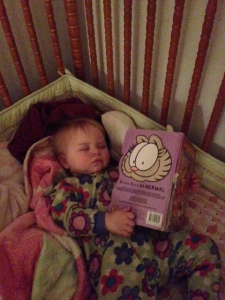 L reading herself to sleep