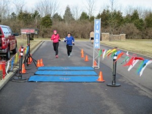 Here I am in the blue shirt finishing up the 5k.